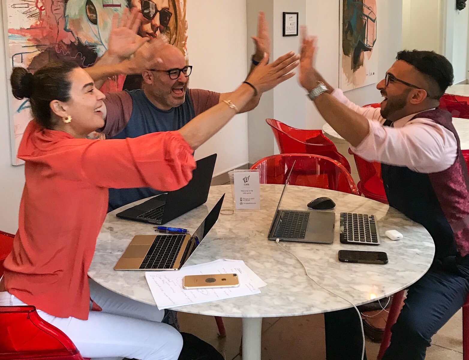 Jay Mandel and collaborators celebrating during a working session
